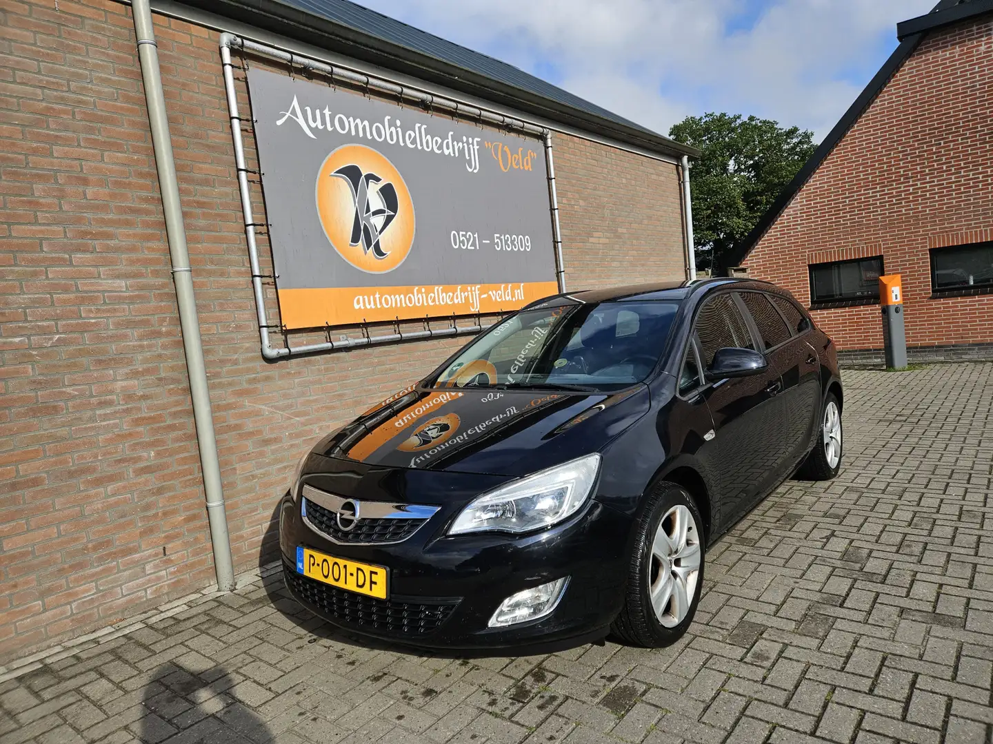 Opel Astra Sports Tourer 1.4 Cosmo (lees tekst) Zwart - 1