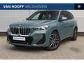 BMW X1 sDrive20i M Sport Automaat / Panoramadak / Trekhaa Grün - thumbnail 1