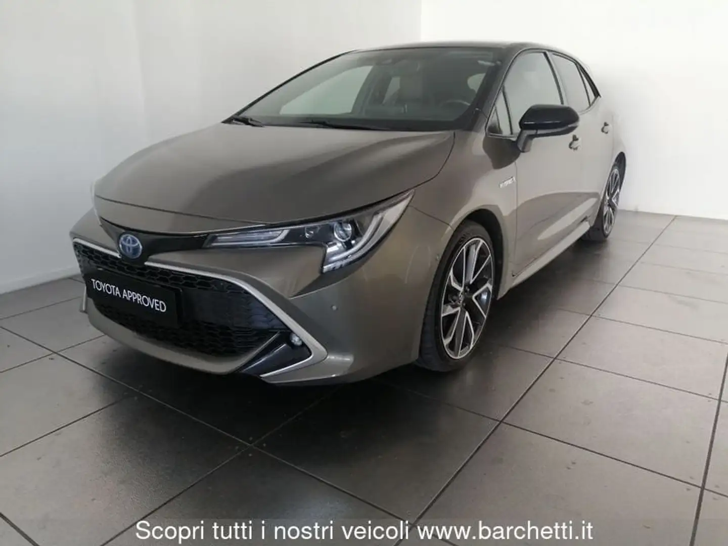 Toyota Corolla 2.0 Hybrid Lounge Bronzo - 1
