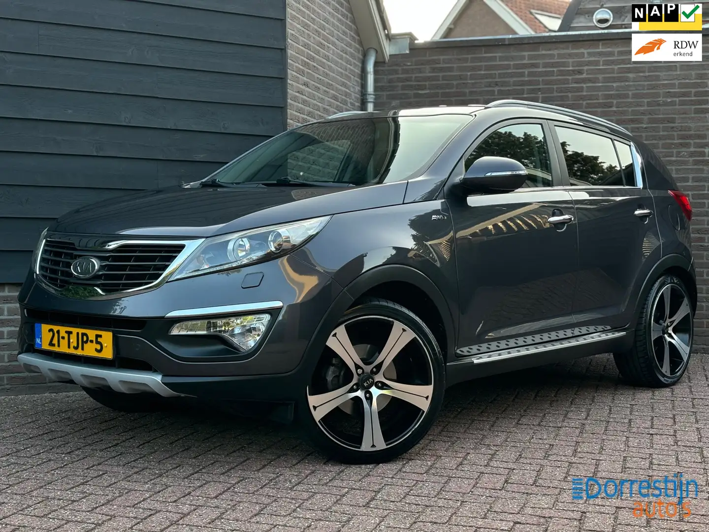 Kia Sportage 2.0 X-clusive 4WD Camara | 20 inch | Trekhaak | NA Gris - 1