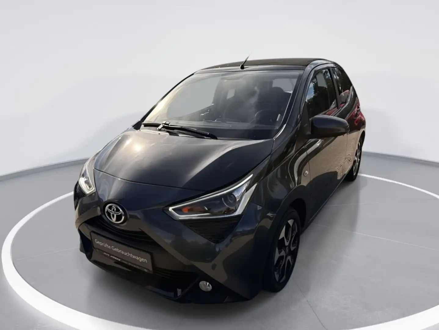 Toyota Aygo x-sky 1.0 5-Gang, el. Faltdach, Sitzhzg., Alu, ZV Gris - 1