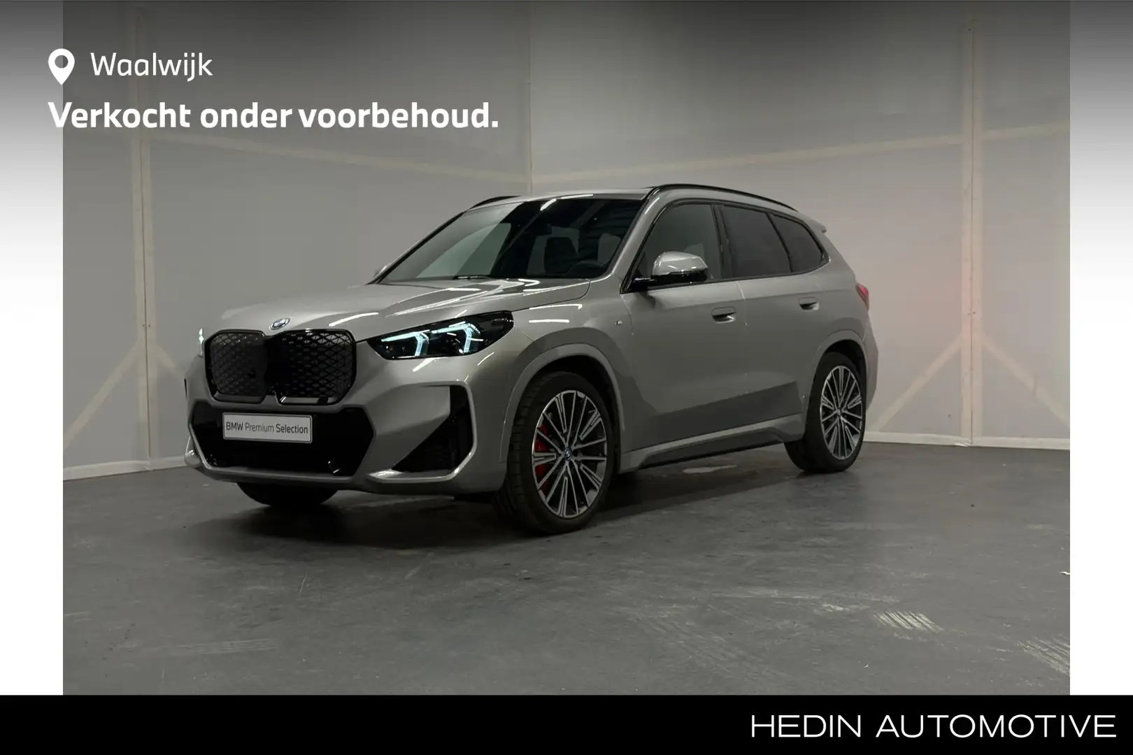 BMW iX1 eDrive20 67 kWh | M-Sportpakket | Panoramadak | Ad Gris - 1