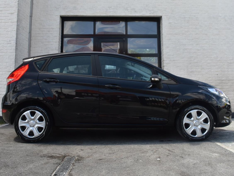 Ford Fiesta 1.25i Titanium / Topstaat / Airco / Garantie — photo 6