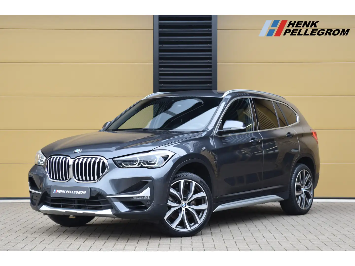 BMW X1 sDrive20i High Executive * LED Koplampen * Harman/ Grau - 1