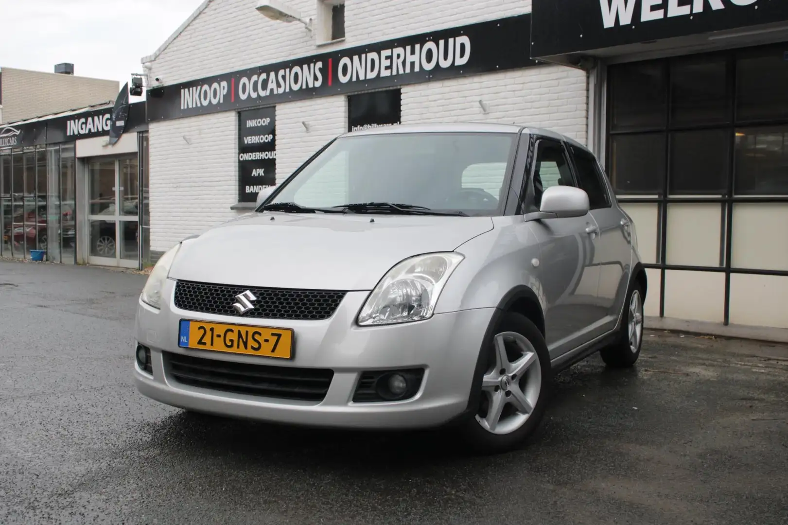 Suzuki Swift 1.3 Shogun / Airco / Elektrische ramen / Gris - 1