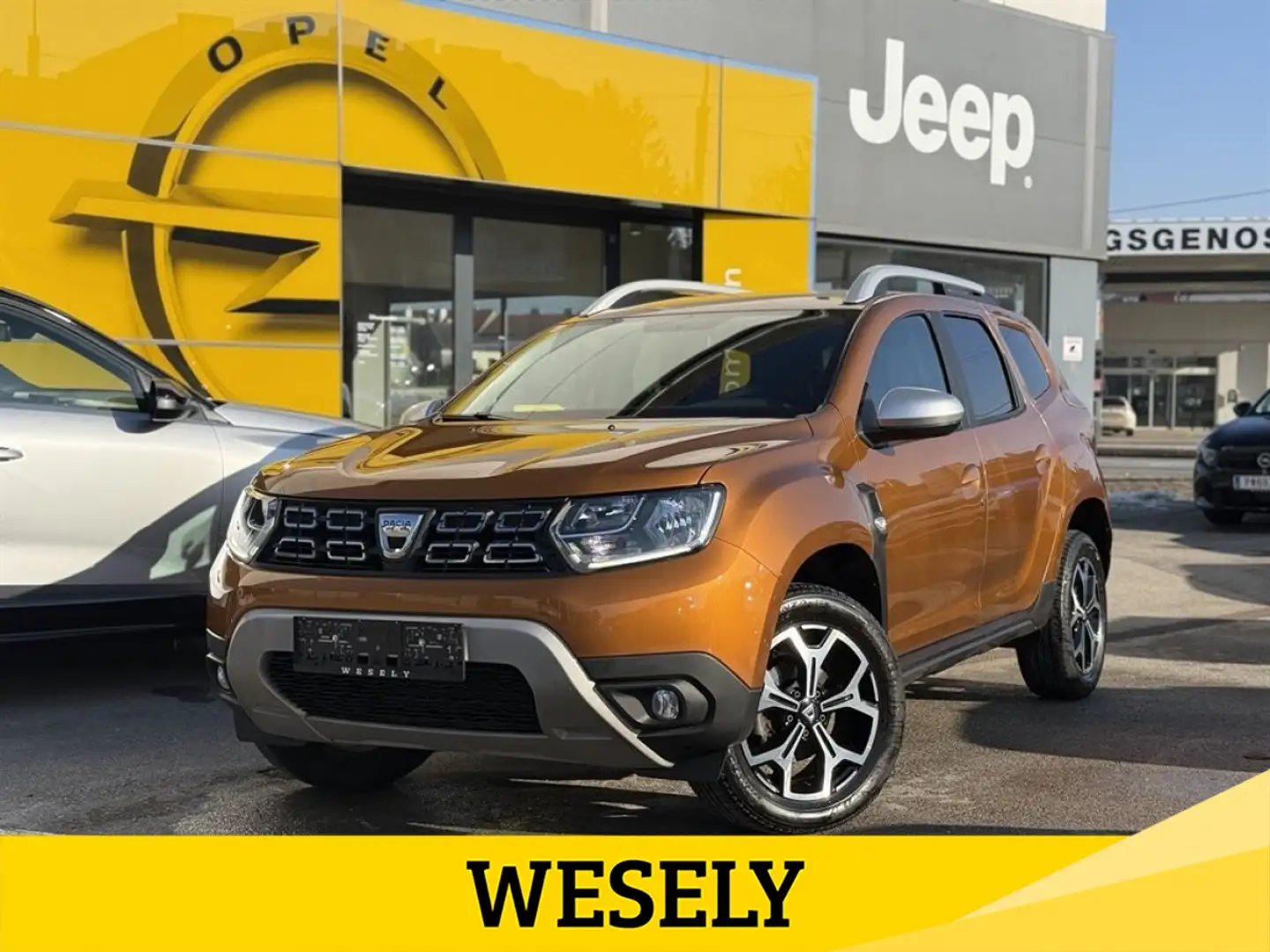 Dacia Duster TCe 130 PF Prestige Orange - 1