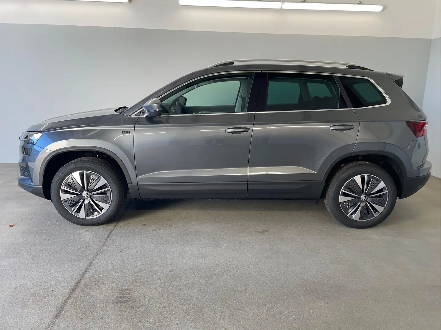 Skoda Karoq 1.5TSI Select AHK/VC/Alu/SmartLNavi/LED/Kamera/DAB Gris - 1