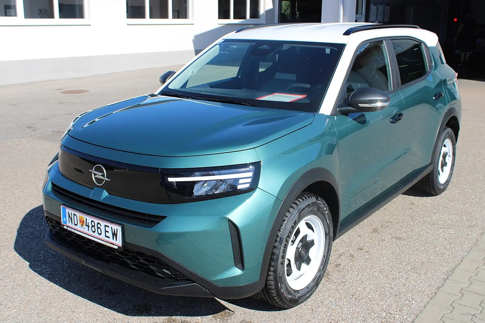 Opel Frontera 1.2 DI MHEV Edition Aut. Grün - 1