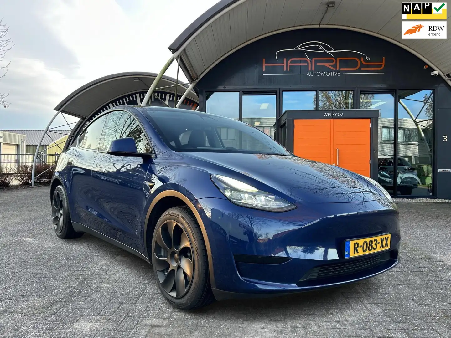 Tesla Model Y RWD 58 kWh 95% SOH Trekhaak BTW Auto 1e EIG Rijkla Blauw - 1