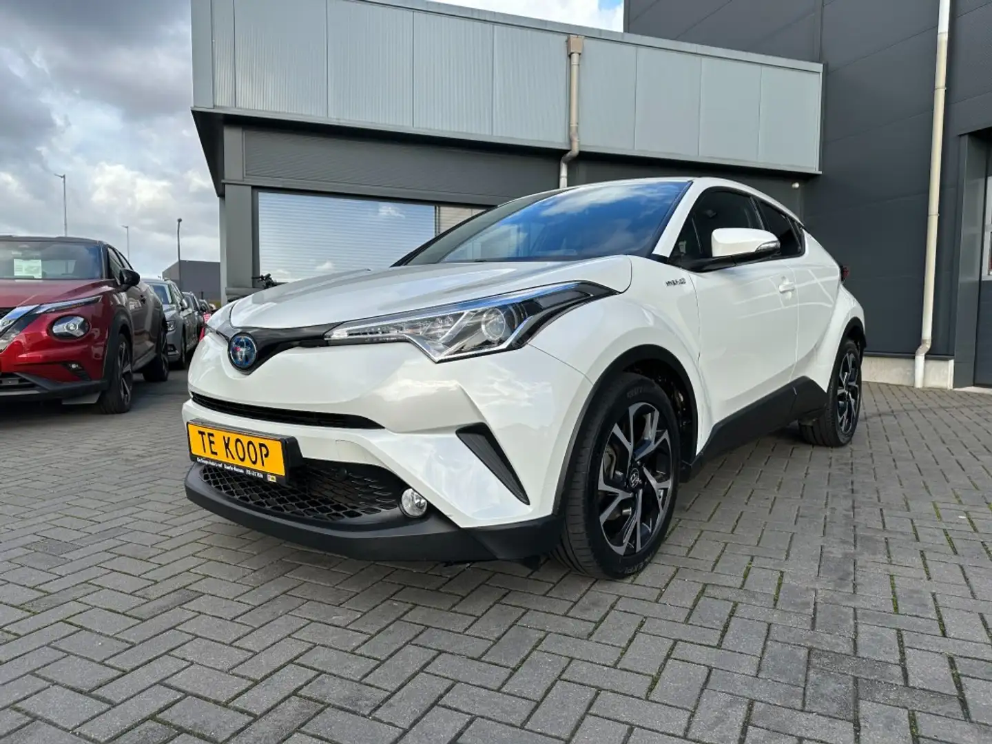 Toyota C-HR 1.8i Hybride Aut. Dynamic Navi. Camera stoelverw. Weiß - 1