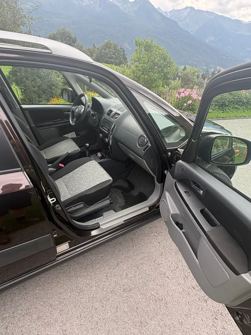 Suzuki SX4 SX4 1,6 GLX 4WD Traveller GLX Traveller Braun - 1