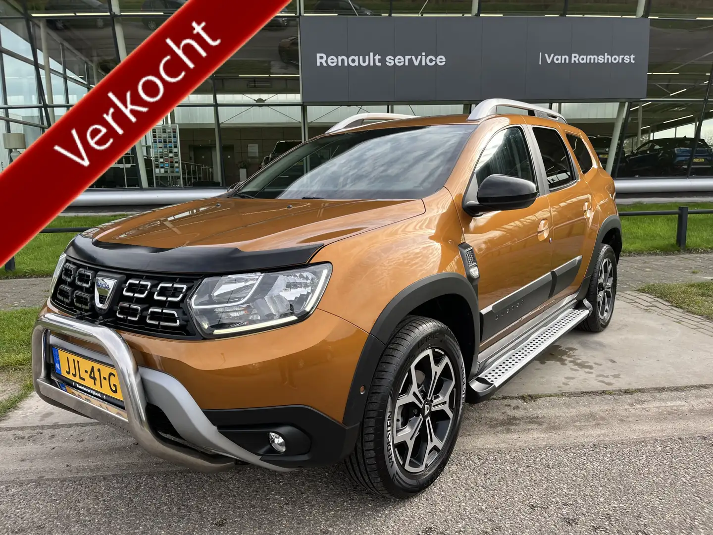 Dacia Duster 1.2 TCe Prestige 126 PK / Trekhaak / Camera / Park Orange - 1