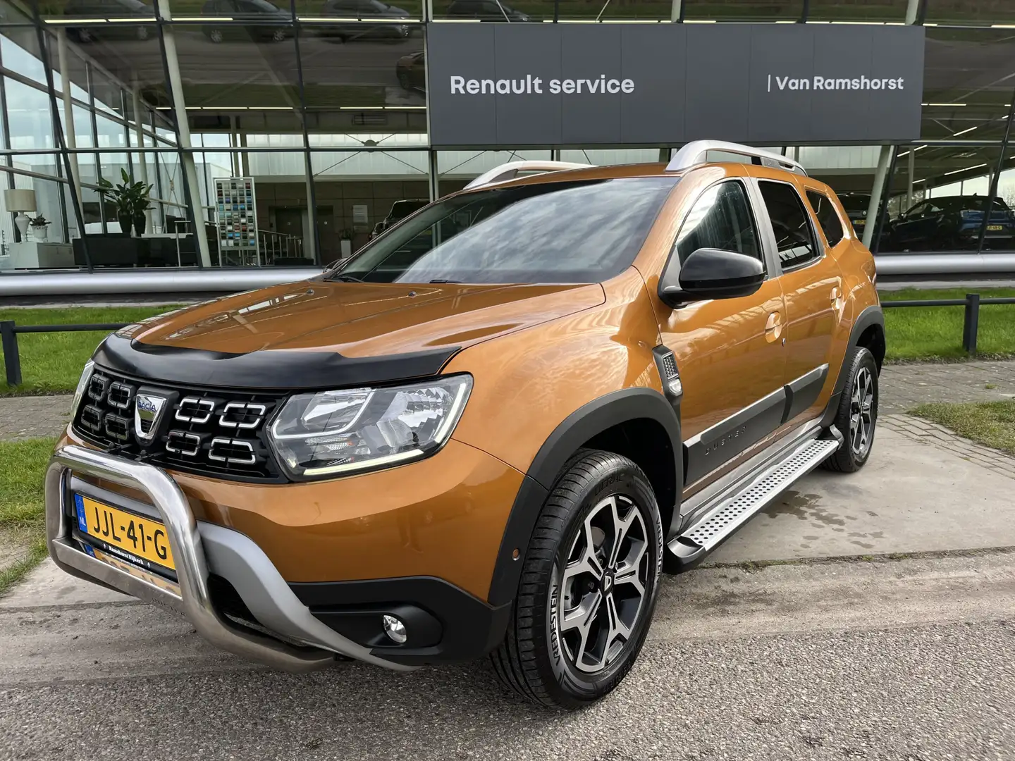Dacia Duster 1.2 TCe Prestige 126 PK / Trekhaak / Camera / Park Naranja - 1