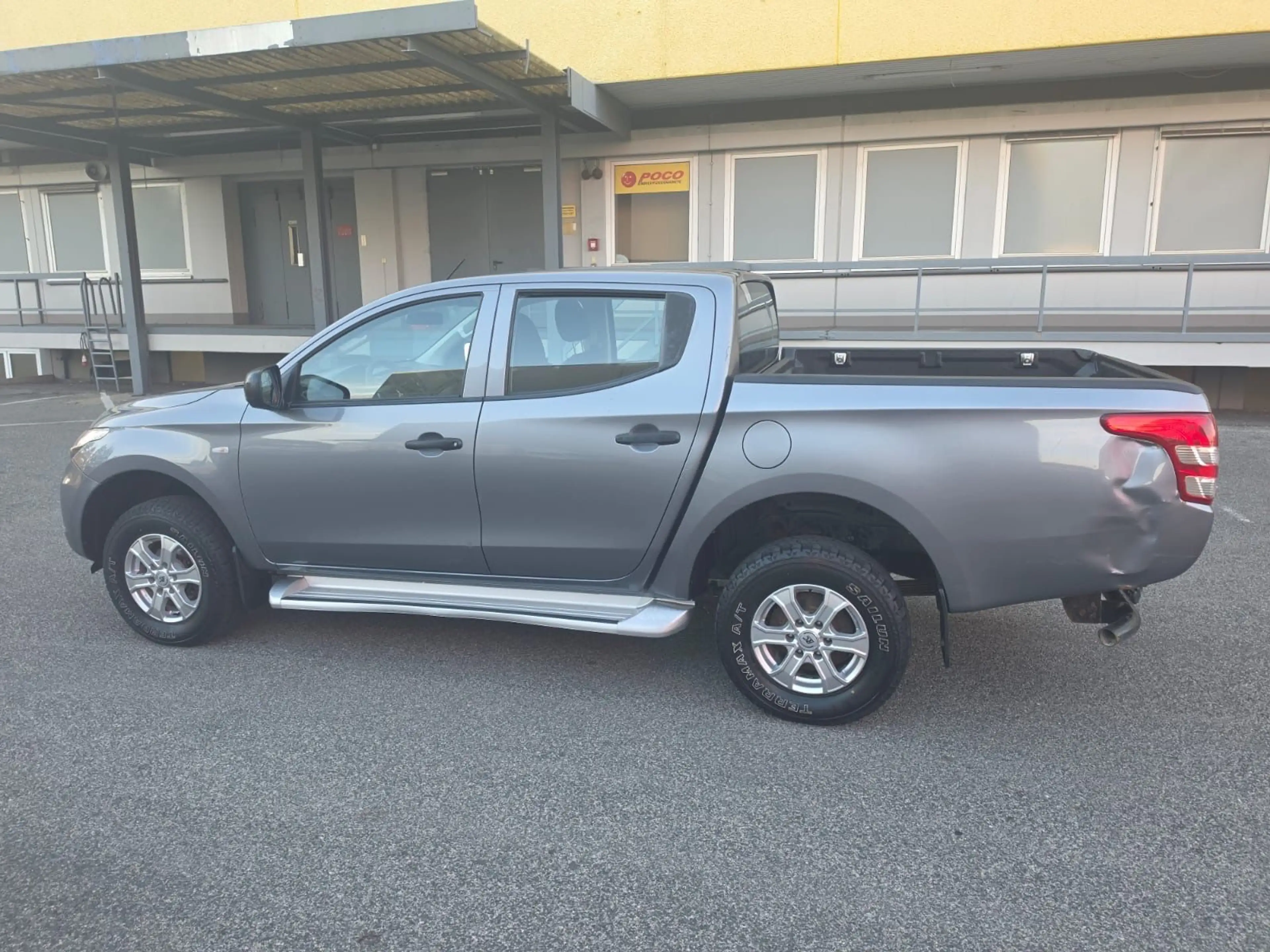 Mitsubishi L200 — photo 8
