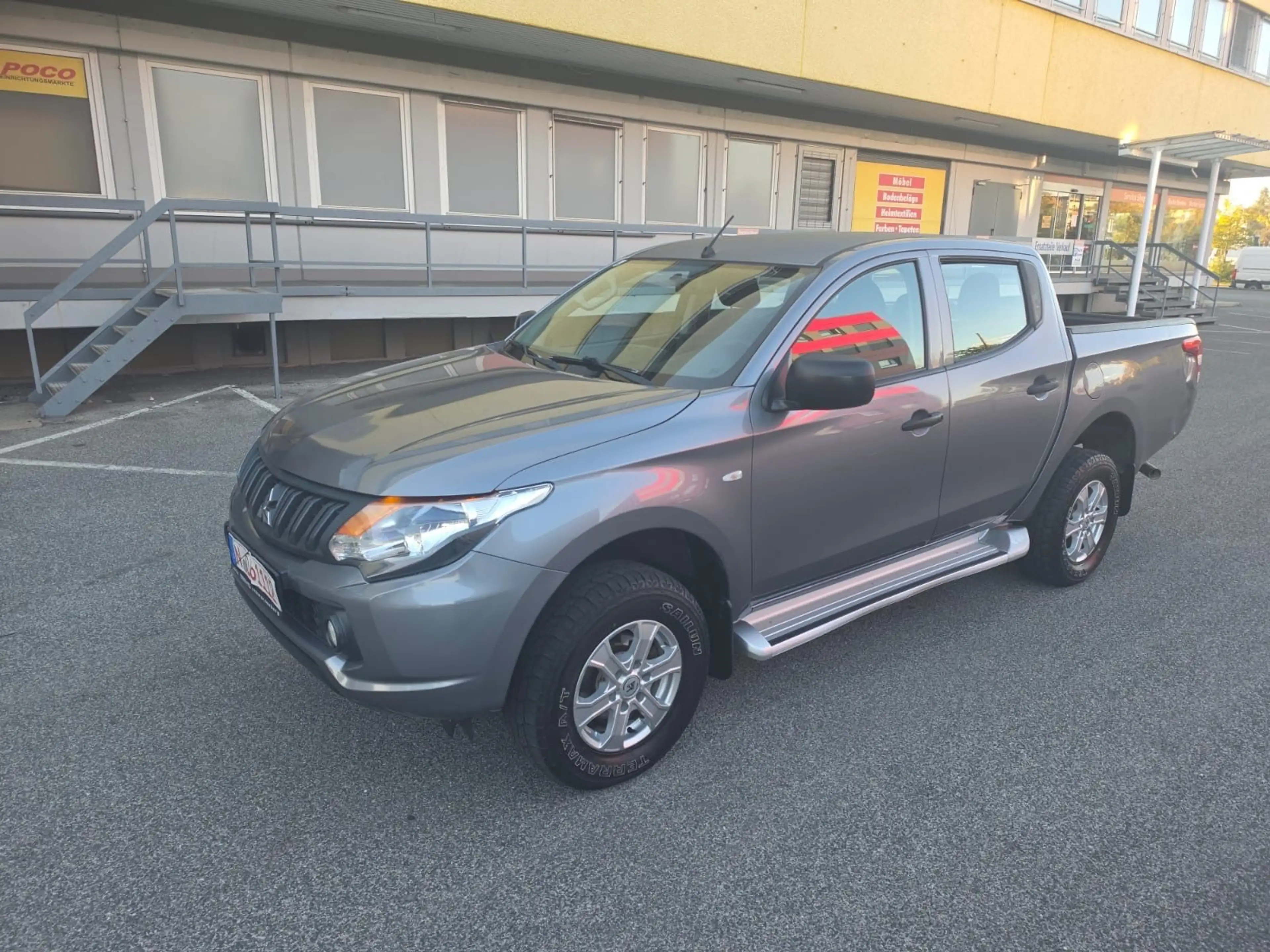 Mitsubishi L200 — photo 13