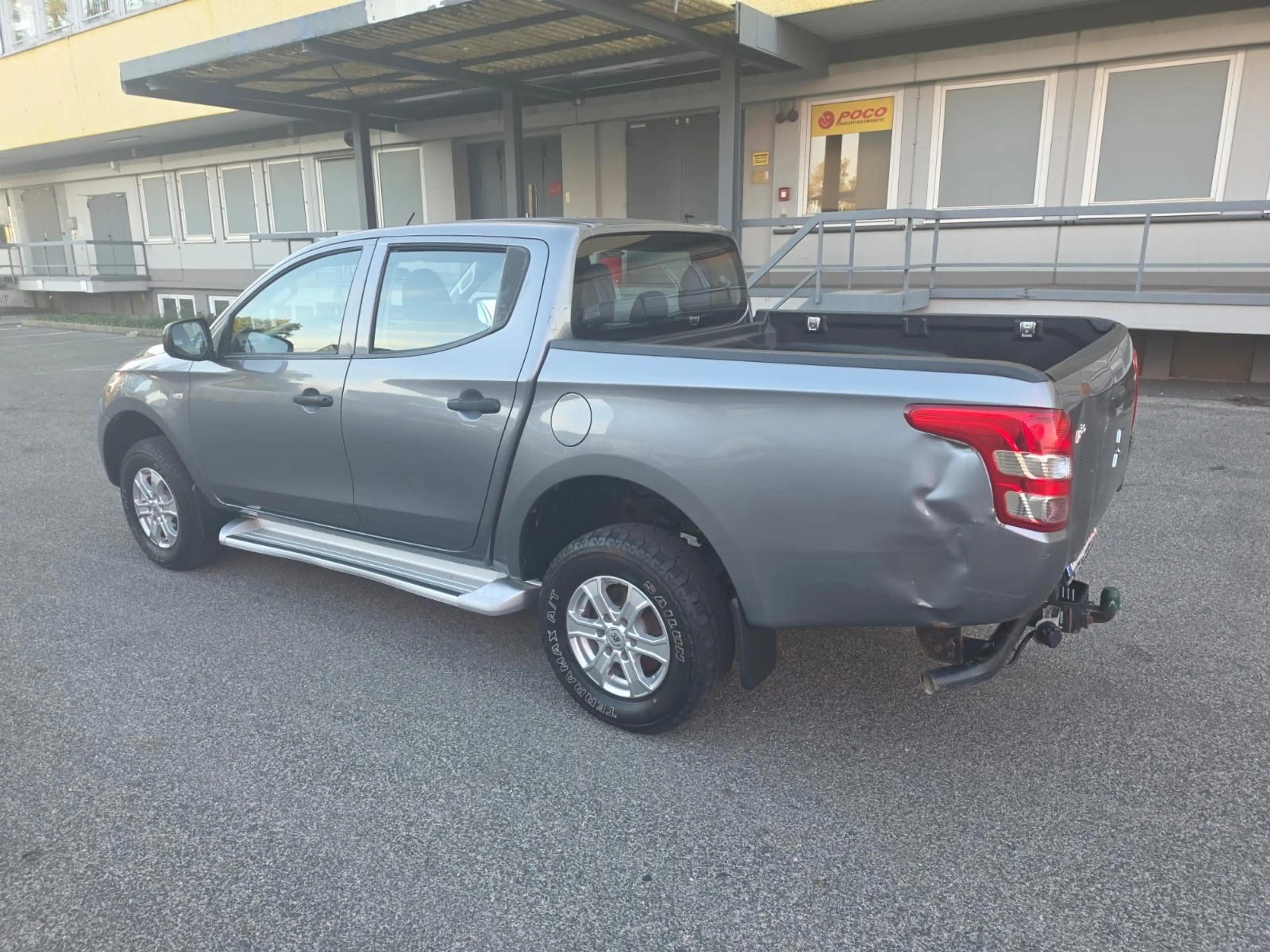 Mitsubishi L200 — photo 7