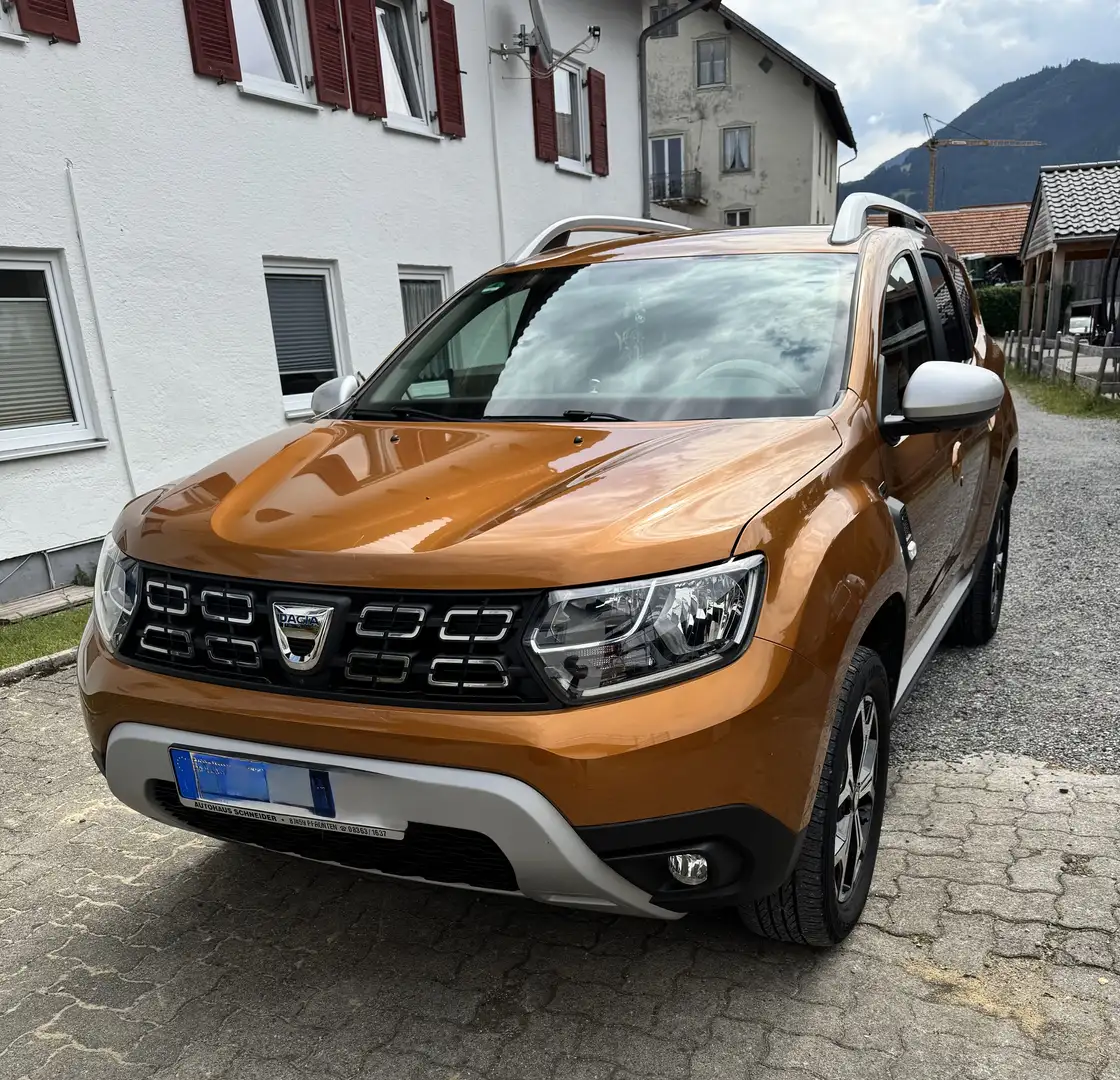 Dacia Duster TCe 150 4WD Adventure Portocaliu - 1