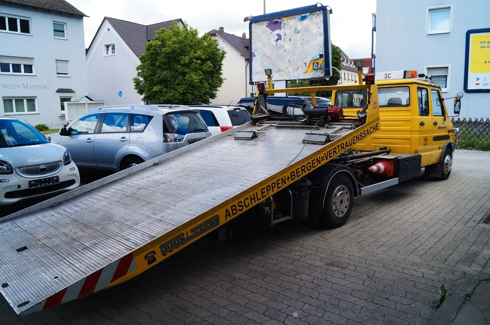 Iveco Turbo Daily 59 E-12 Abschlepwagen Schiebeplateau Amarillo - 1
