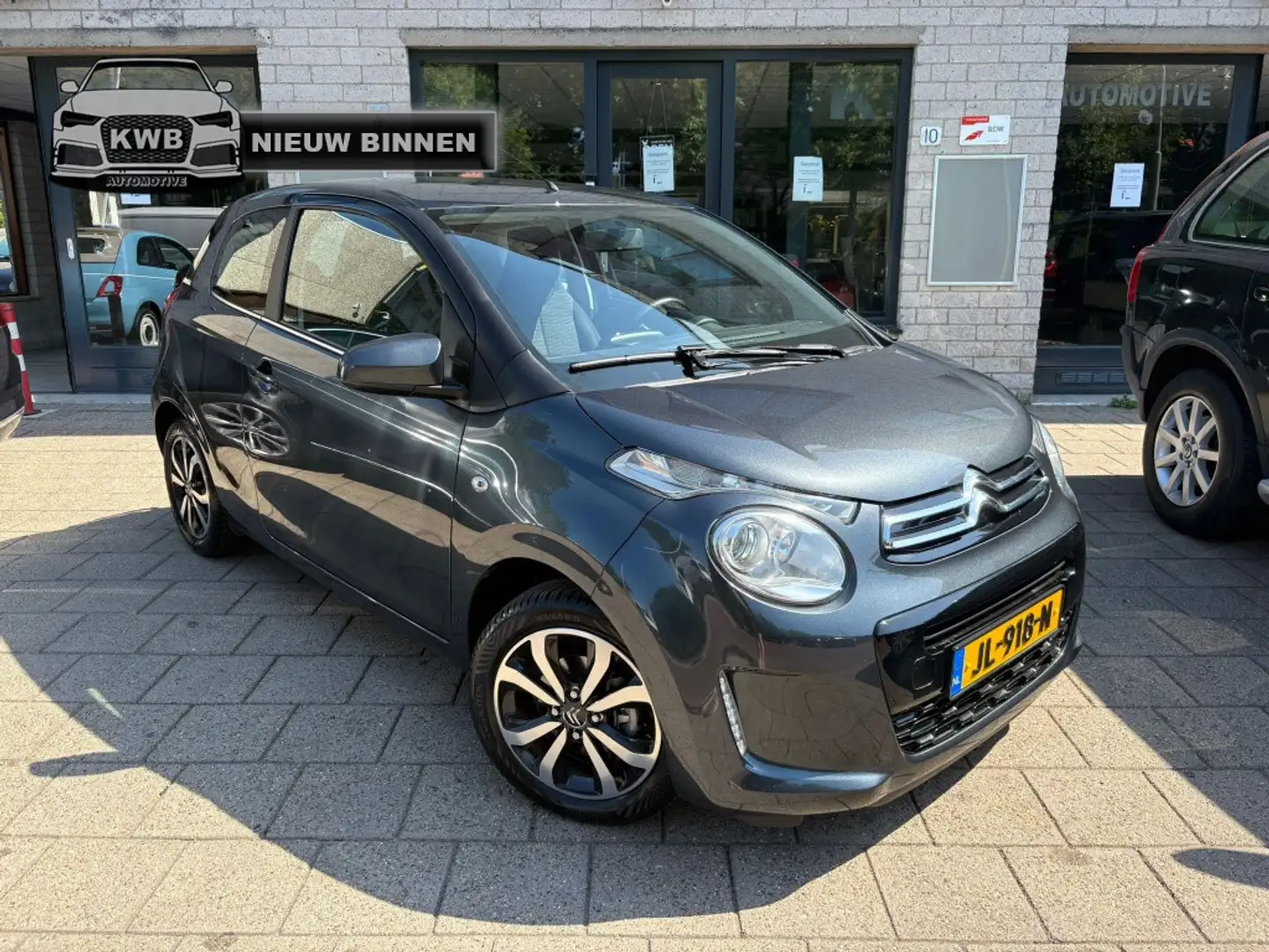 Citroen C1 1.2 PureTech Shine Camera NAP Dealer ODH Grijs - 1