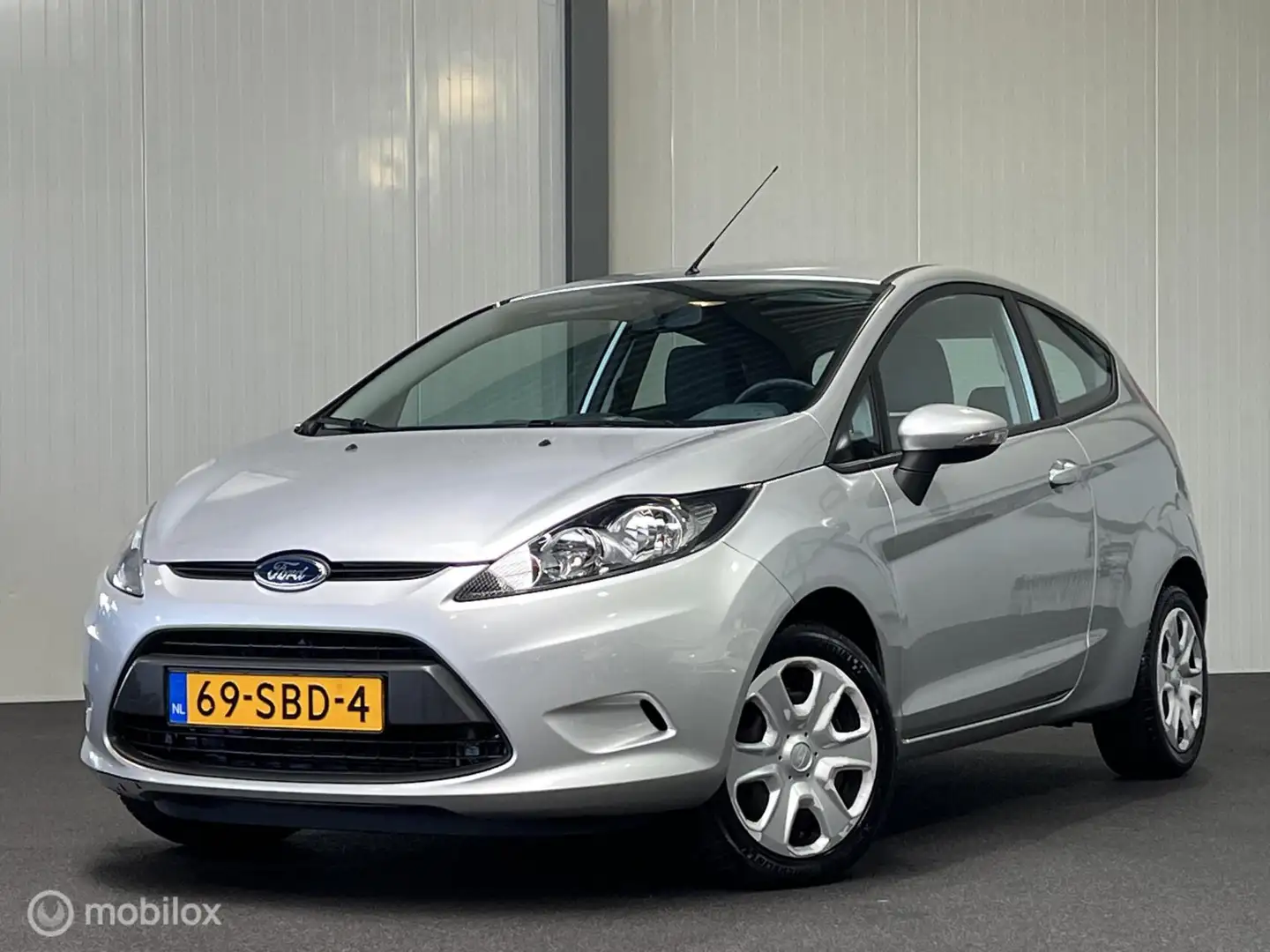 Ford Fiesta 1.25 Limited [ 1e eigenaar NAP airco ] Grijs - 1