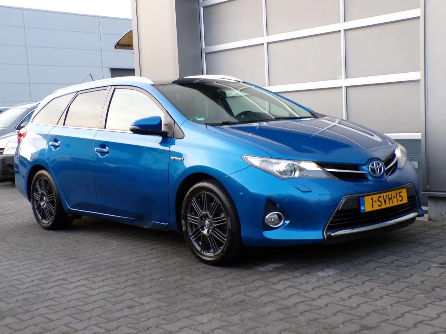 Toyota Auris Touring Sports 1.8 Hybrid Lease+ Pano/Clima/Stoelv Bleu - 1