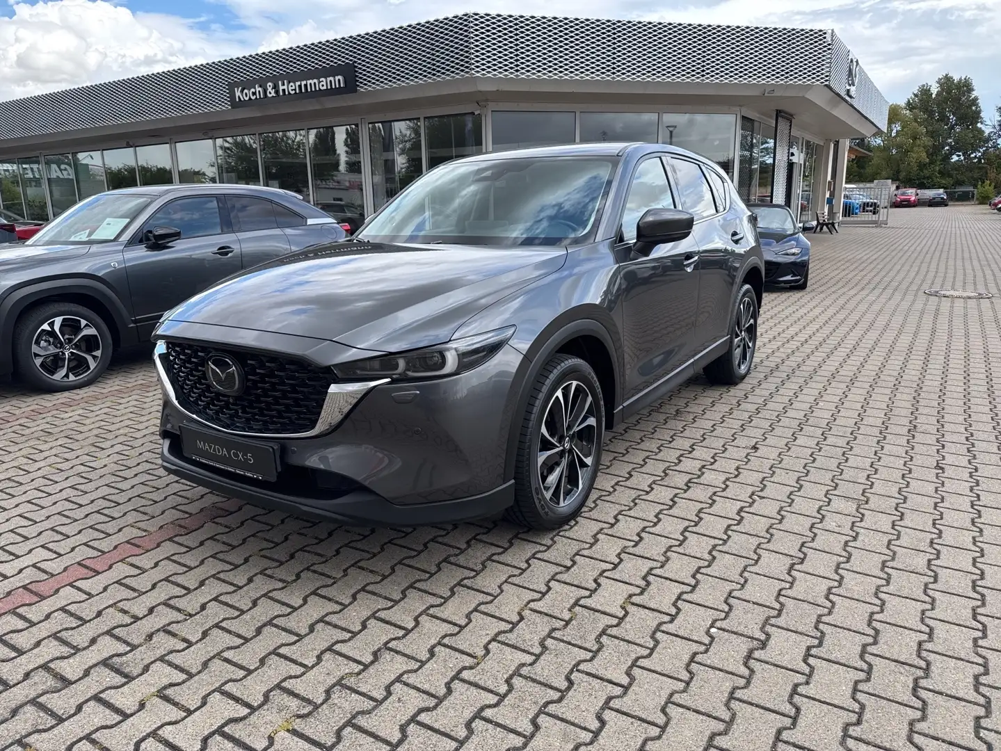 Mazda CX-5 SKYACTIV-G 194 Werksgarantie bis 09/2028 Grijs - 1