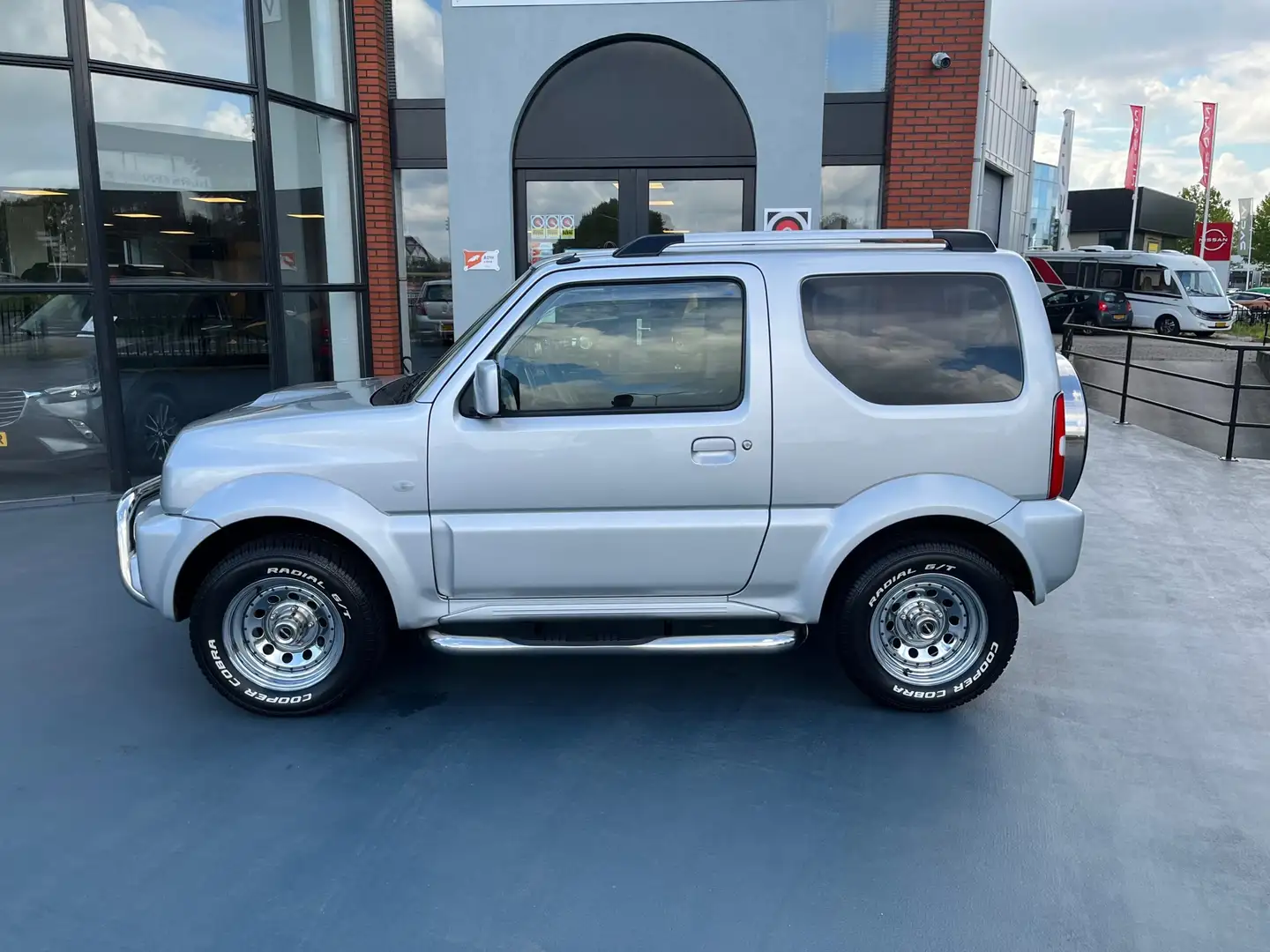 Suzuki Jimny 1.3 Exclusive AIRCO 4X4 LEDER STOELVERWAMING Gris - 2