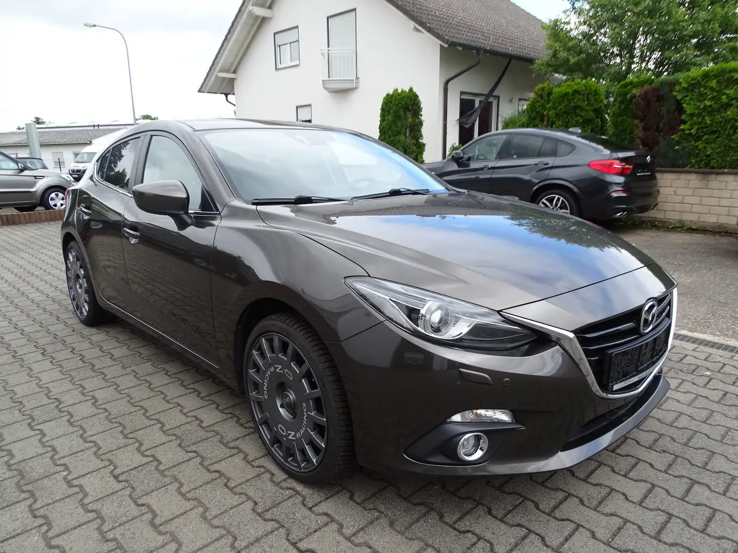 Mazda 3 2,0l Sports-Line, Navi, 19 Zoll OZ LM-Felgen, Sitz Grau - 1