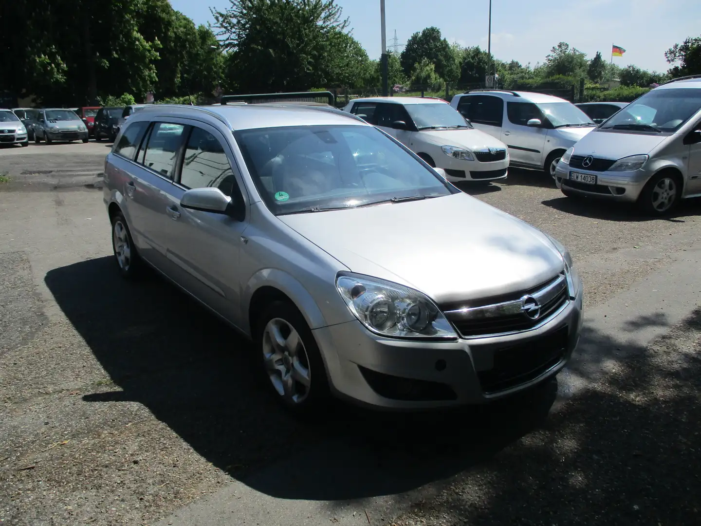 Opel Astra 1.6 Caravan Cosmo Plateado - 1