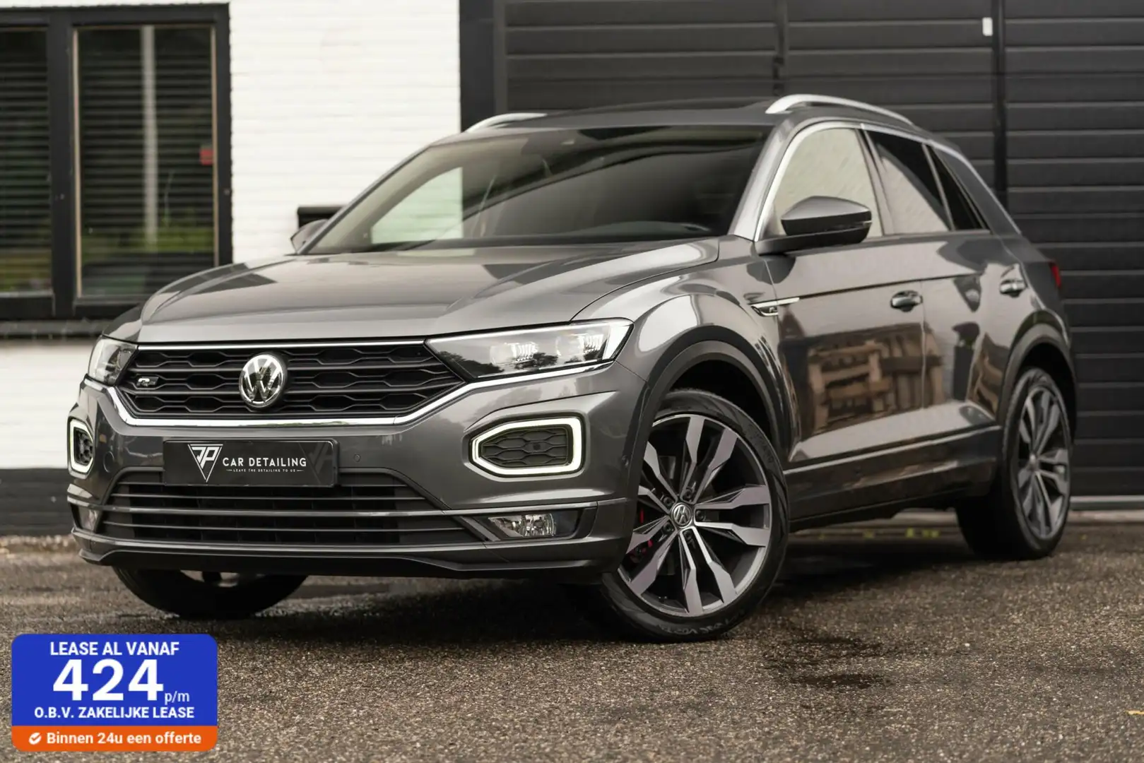 Volkswagen T-Roc 1.5 TSI Sport Bus R / Pano / Cam / Trekhaak Grijs - 1