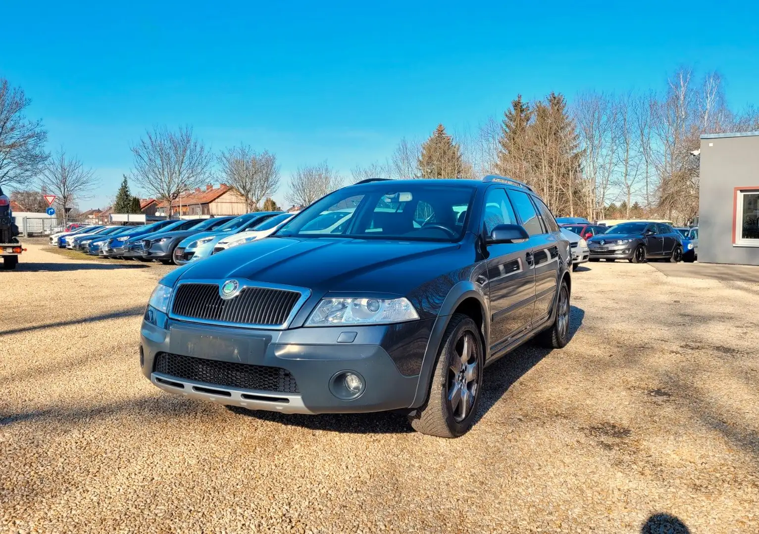 Skoda Octavia Combi Scout 4X4*SZH*Klima*LMF*PDC*Temp* Grau - 1
