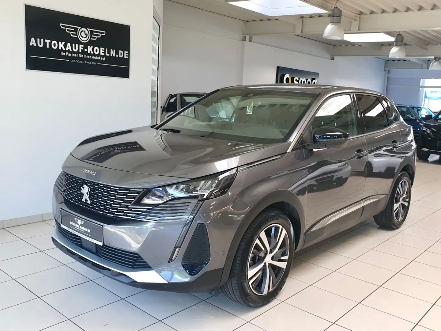 Peugeot 3008 1,2 12V e-THP PureTech Allure Pack Grijs - 2