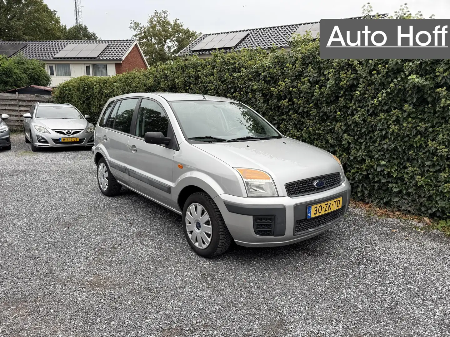 Ford Fusion 1.4-16V Cool & Sound | Airco | Elekt. Ramen | APK Grijs - 1