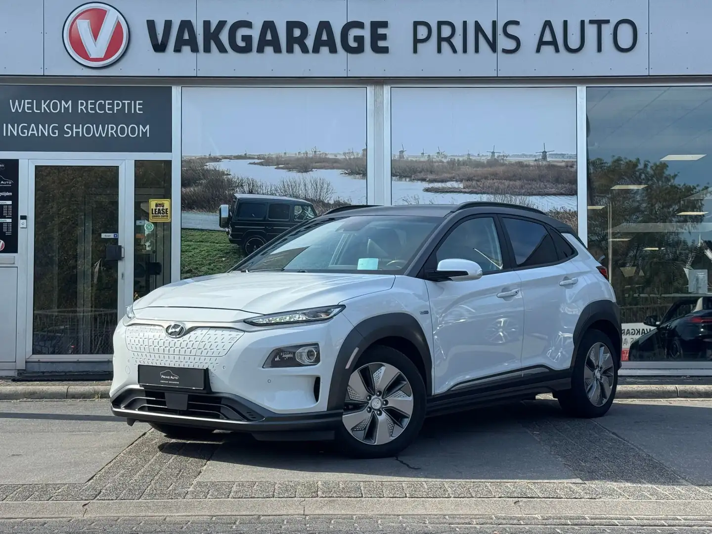 Hyundai KONA EV Premium 64 kWh |LEDER|HEAD-UP|NAVI|STOELVW|ADAP Blanc - 1