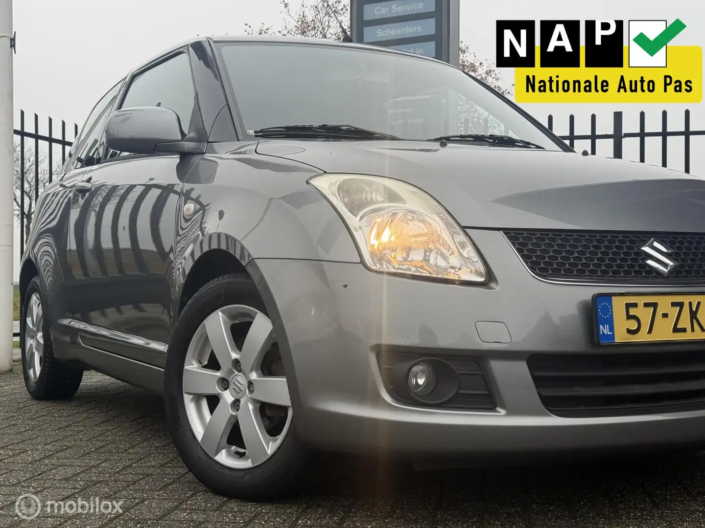 Suzuki Swift 1.3 Comfort | Automaat | Airco | 1e Eigenaar Gris - 2