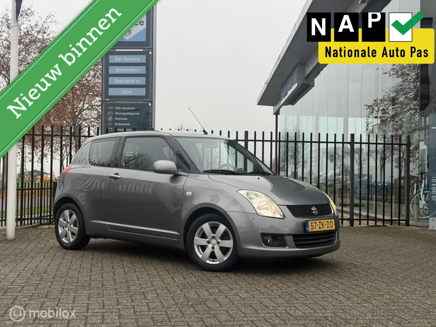 Suzuki Swift 1.3 Comfort | Automaat | Airco | 1e Eigenaar Gris - 1
