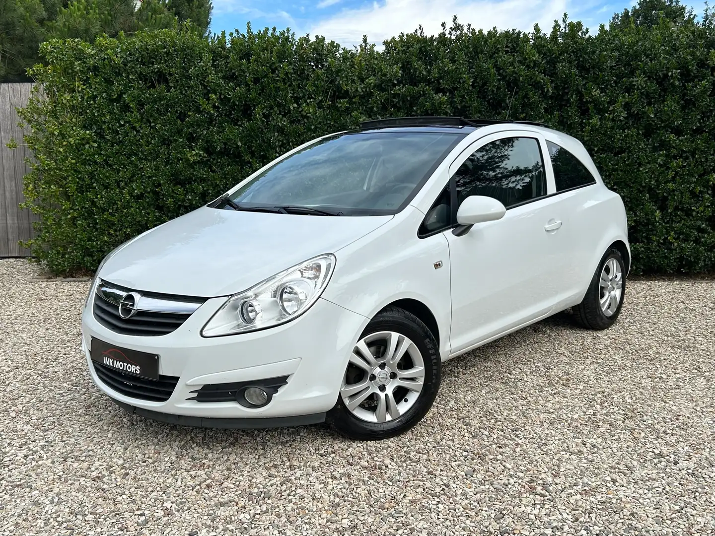 Opel Corsa 1.4 BENZINE 2009 (MET GARANTIE) Wit - 1