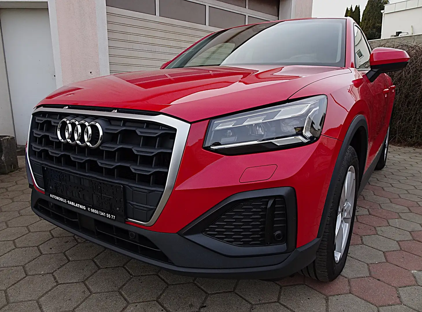 Audi Q2 35 TFSI Admired S tronic Leder, Navi, LED, AHV Rot - 1