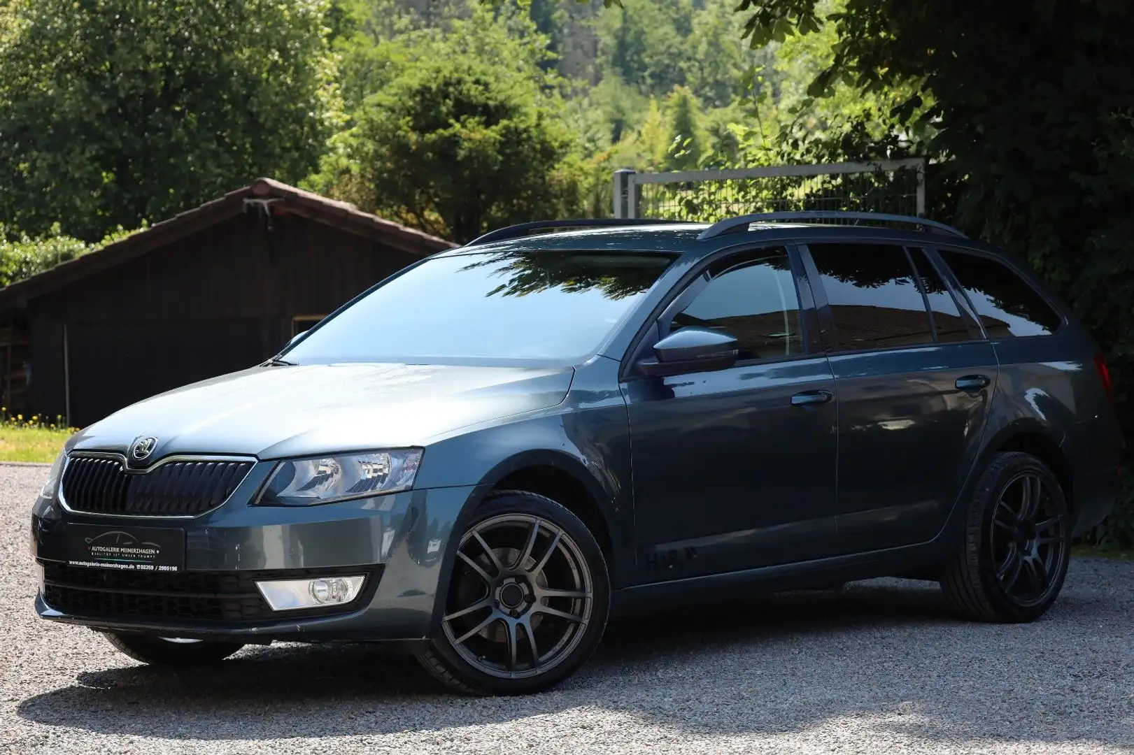 Skoda Octavia 2.0 TDI Combi Ambition 4x4/AHK/NAVI/SHZ/ Grijs - 1