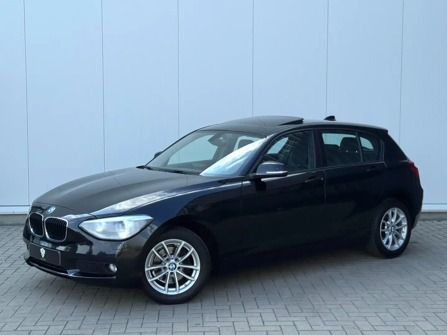 BMW 116 iA✅GARANTIE Open Dak Xenon Navi Leder Z.Verw. Schwarz - 1