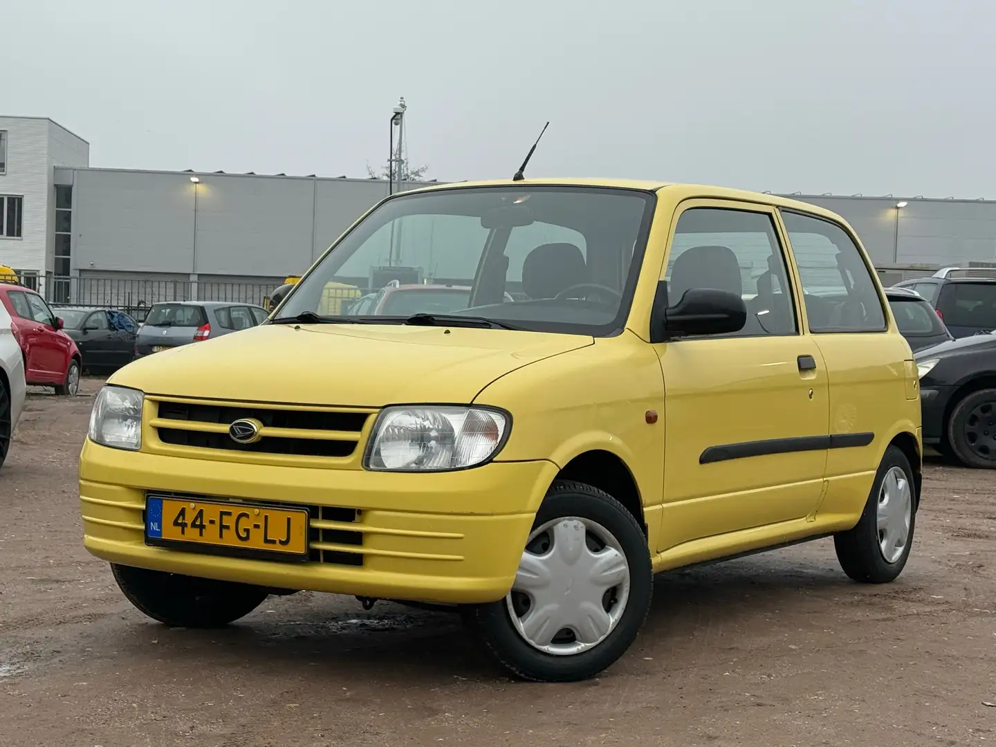 Daihatsu Cuore 1.0-12V XTi/ AUTOMAAT/ LAAG KM Gelb - 1