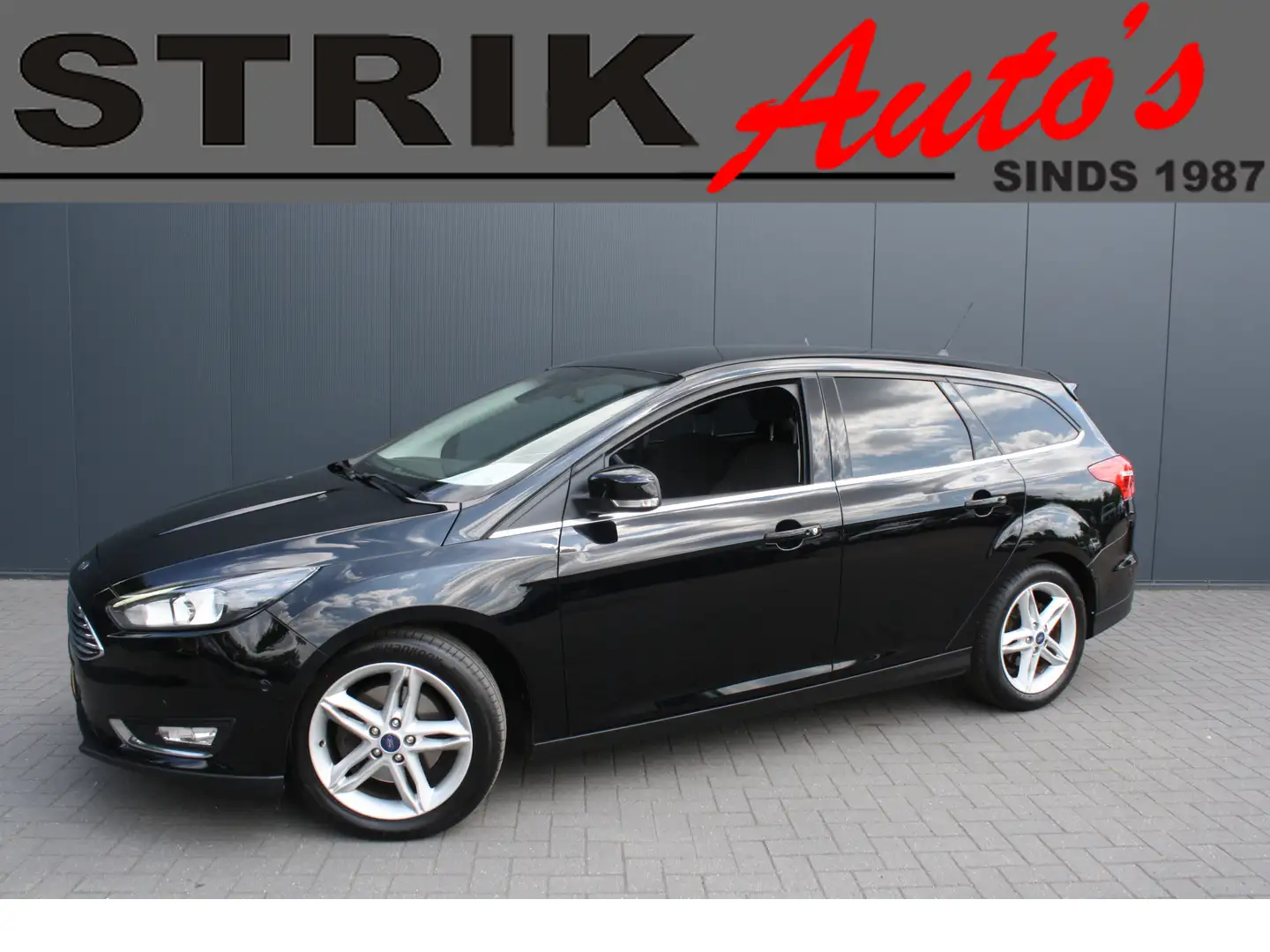 Ford Focus Wagon 1.5 Titanium - NAVIGATIE - CAMERA - TREKHAAK Zwart - 1