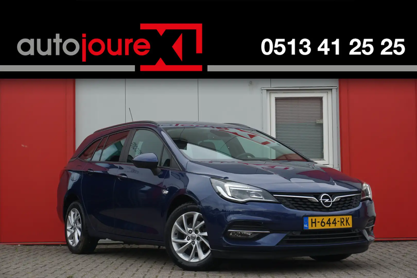 Opel Astra Sports Tourer 1.4 Automaat Business Edition | Navi Blauw - 1