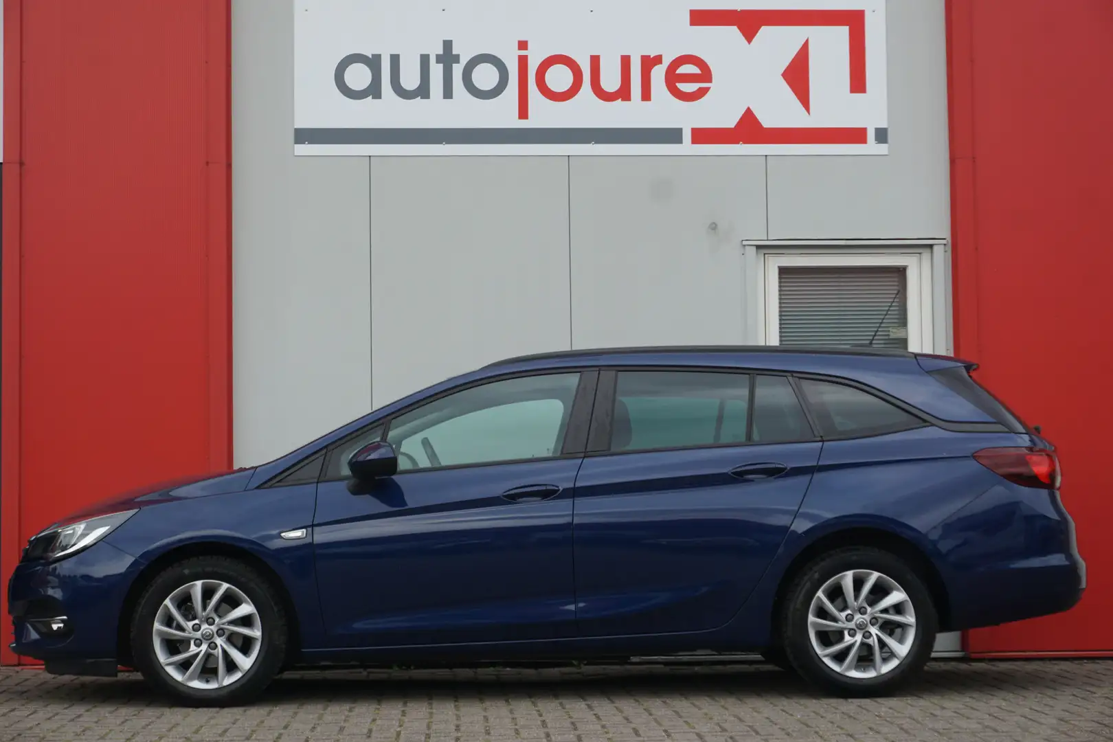 Opel Astra Sports Tourer 1.4 Automaat Business Edition | Navi Blauw - 2