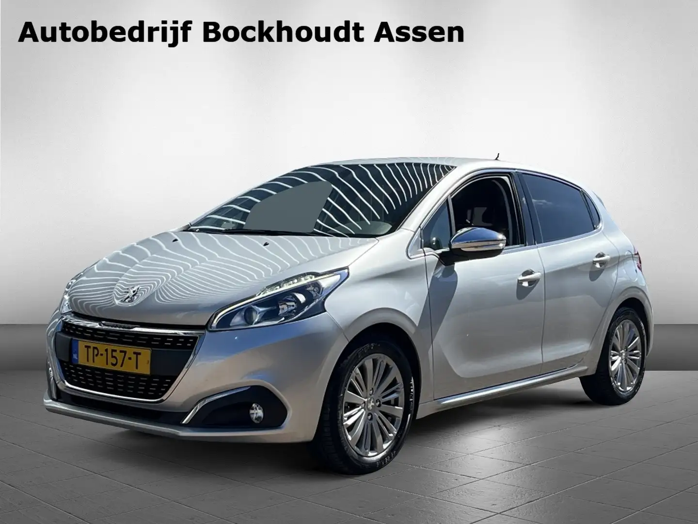 Peugeot 208 1.2 PureTech Allure | Navigatie | Climate Control Gris - 1