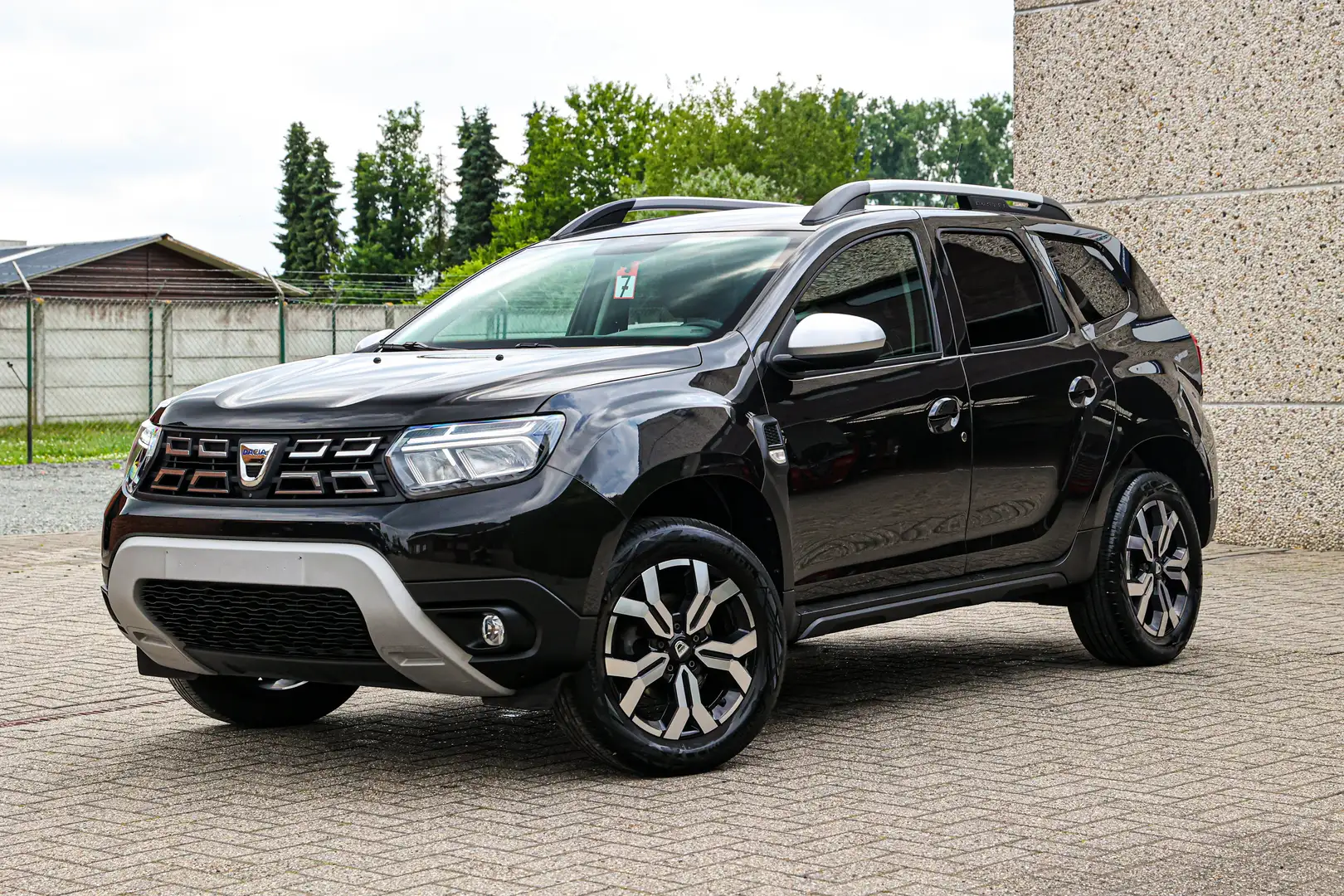 Dacia Duster PRESTIGE-UITVOERING*CAMERA*SENSOREN*NAVIGATIE* Siyah - 1