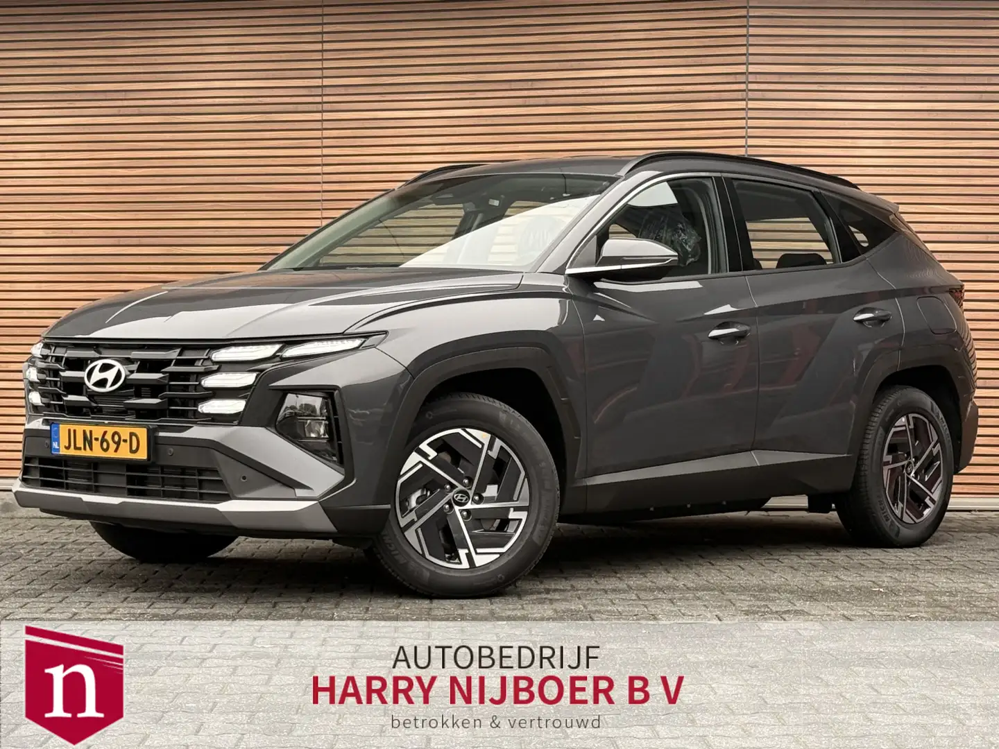 Hyundai TUCSON 1.6 T-GDI PHEV Comfort Camera / Navigatie / Camera Grau - 1