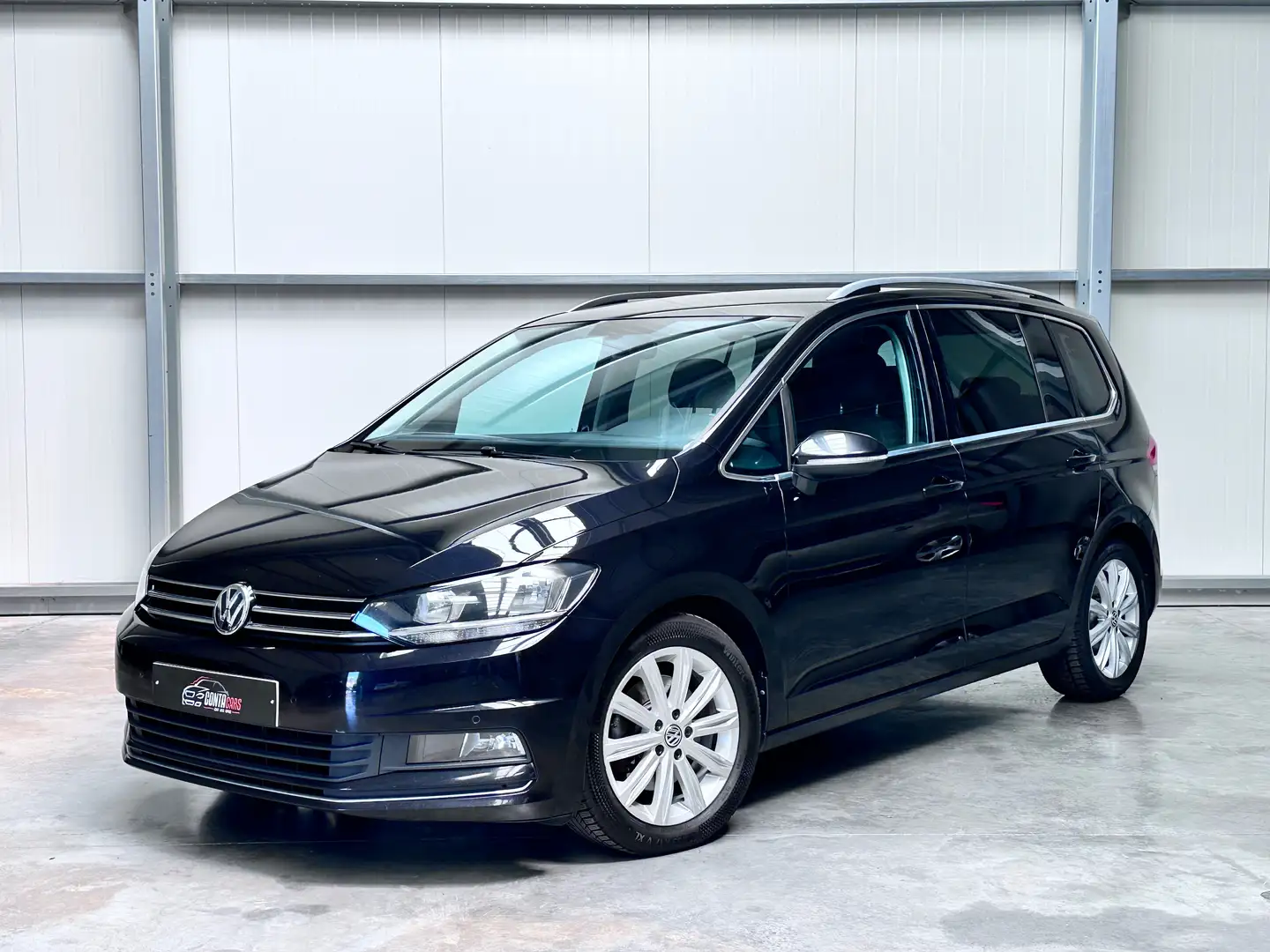 Volkswagen Touran *GARANTIE 12 MOIS* Touran 1.0 TSI 7PL.  Highline Zwart - 1
