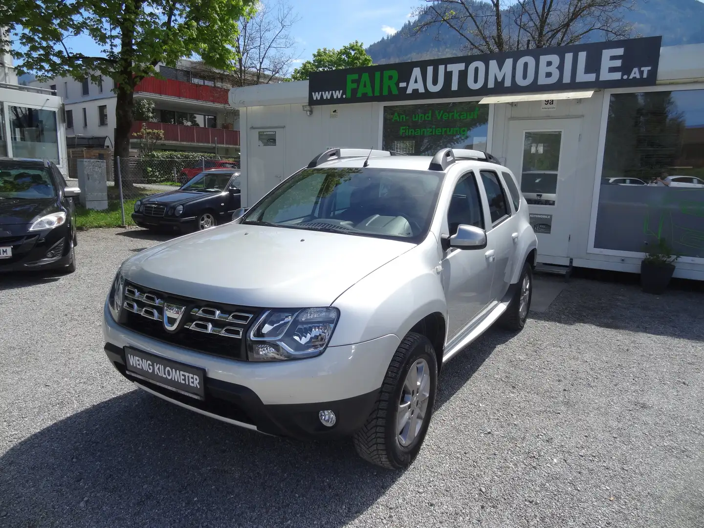 Dacia Duster Basis 4X2 1.BESiTZ // NAVi // PDC // SHZ // LEDER Gris - 1
