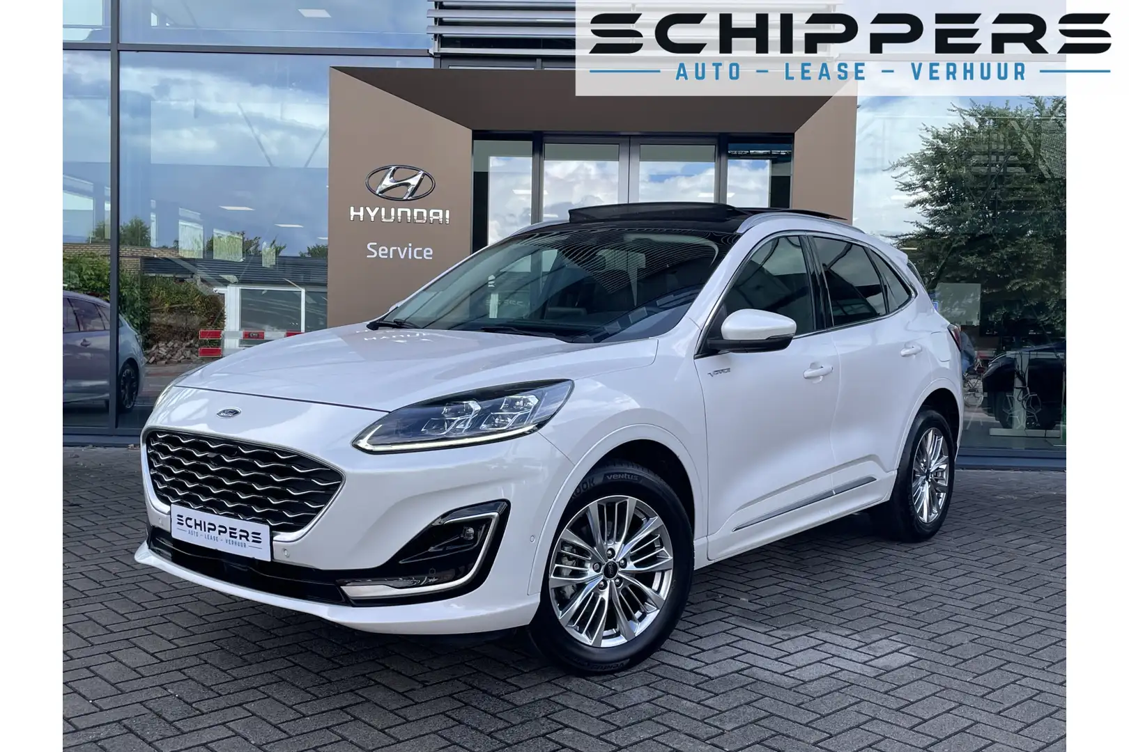 Ford Kuga 2.5 HEV Vignale | glazen schuif-kanteldak | Winter Wit - 1